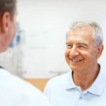 Doctor in discussion with patient at hospital