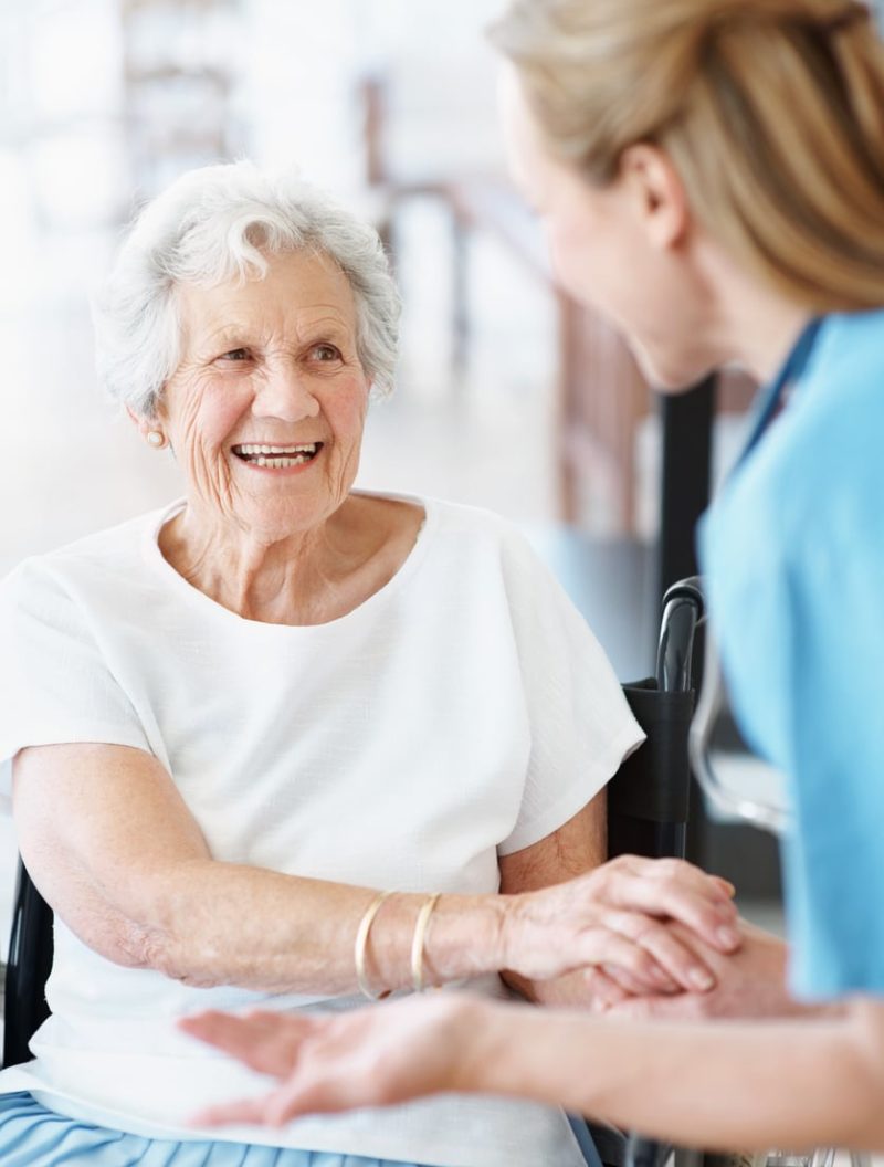 Patient in wheelchair with nurse